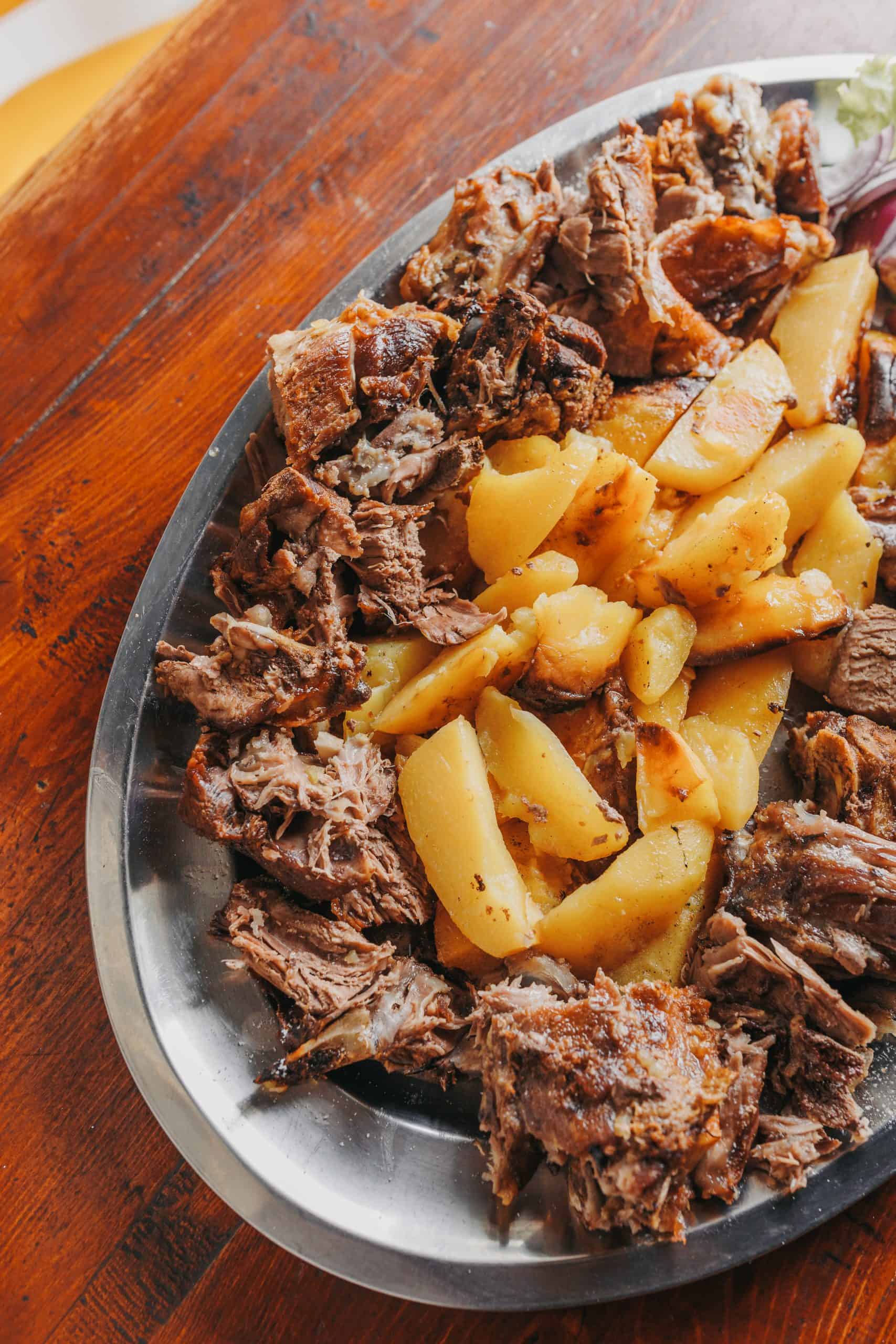 Peka served with grilled vegetables and homemade bread at family-run Dubrovnik restaurant